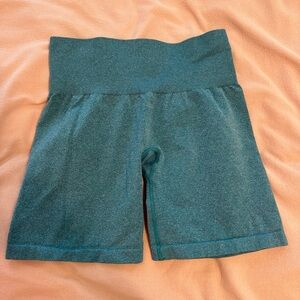 size small dark teal NVGTN workout shorts